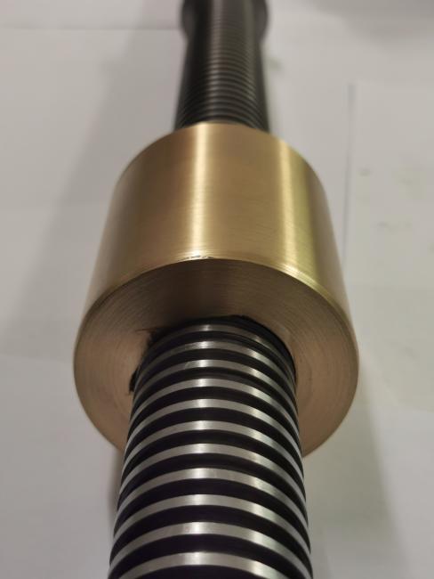 One of the many screws we cut in house on our thread miller!